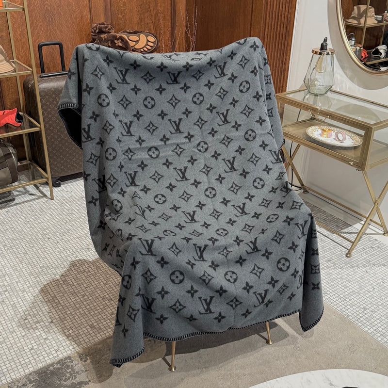 Grey side of Louis Vuitton Neo Monogram Eclipse Black Wool Blend Blanket