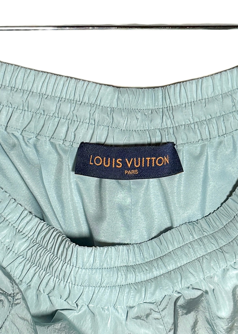 Brand label of Louis Vuitton SS23 Light Teal Mix Material Wool Blend Track Pants