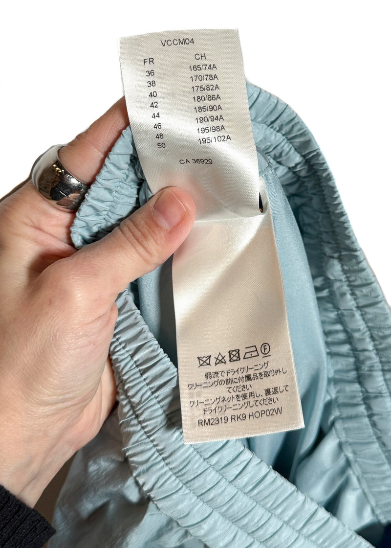 Size and care label of Louis Vuitton SS23 Light Teal Mix Material Wool Blend Track Pants