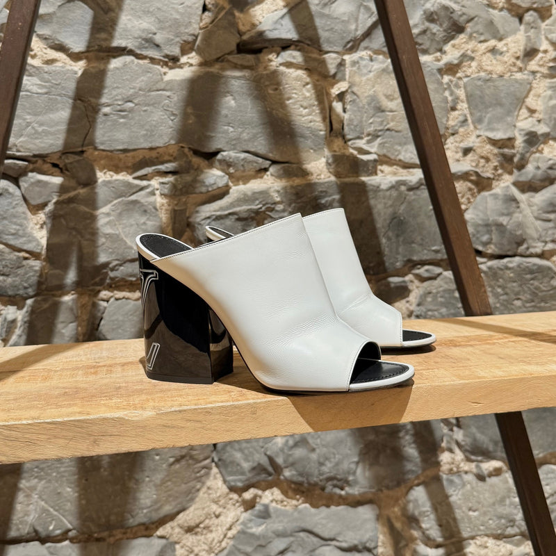 Main photo of Louis Vuitton White Leather Topmost LV Logo Heeled Mules