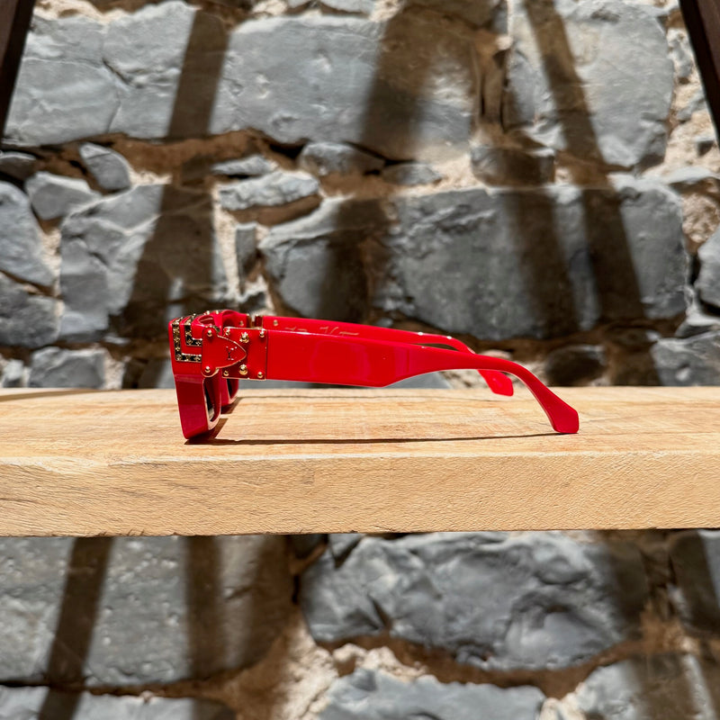 A side view of Louis Vuitton Z1169W 9F2 SS22 Red Acetate 1.1 Millionaires Sunglasses