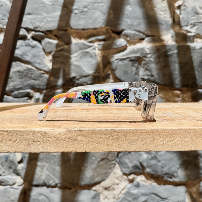 A side view of Louis Vuitton Z2027W 91P FW23 Multicolored Camo Monogram Acetate 1.1 Millionaires Sunglasses