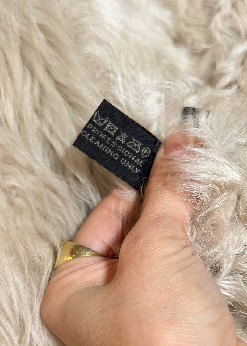 Care label of Marni Brown Shearling Coat