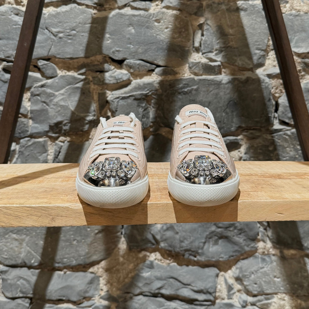 Front view of Miu Miu Nude Pink Patent Crystal Cap Top Sneakers