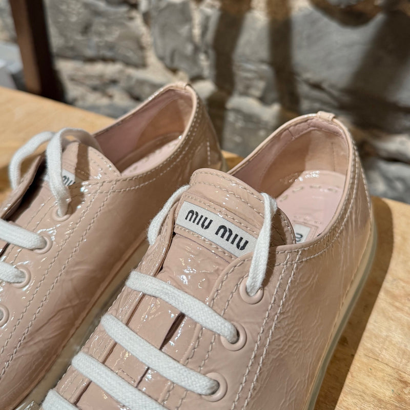 Tongue of Miu Miu Nude Pink Patent Crystal Cap Top Sneakers