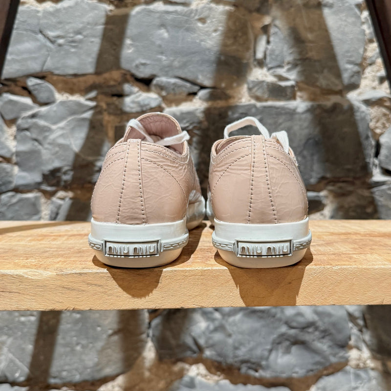 Back view of Miu Miu Nude Pink Patent Crystal Cap Top Sneakers