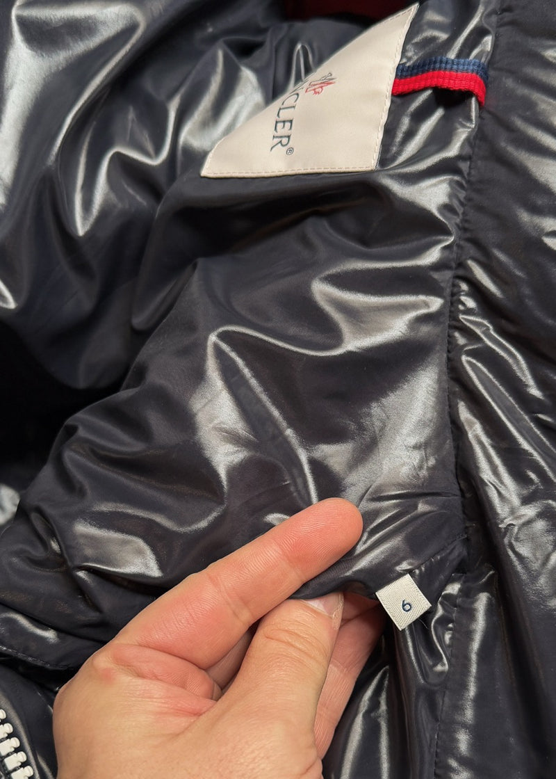 Labels of Moncler X Kith Tricolour Pelat Down Vest