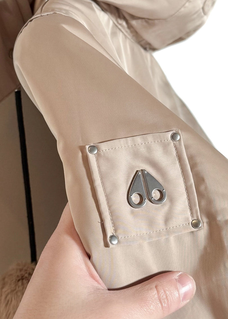 Branded detail of Moose Knuckles Beige Tan Debbie Bunny Reversible Bomber Jacket