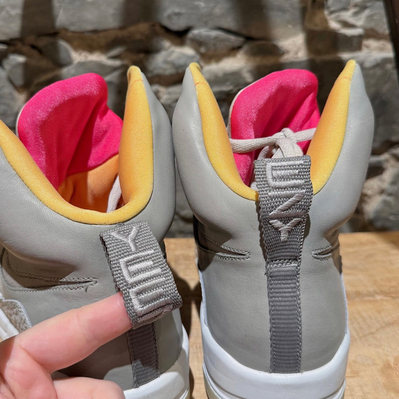 Pull tabs of Nike Air Yeezy 1 Zen Grey High Top Sneakers