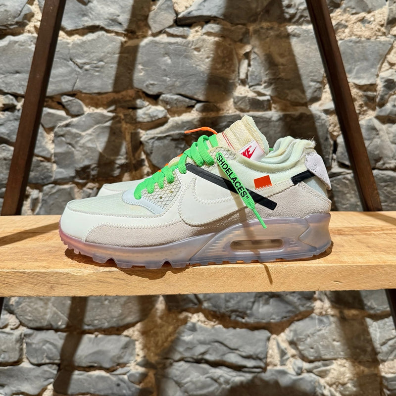A side view of Nike X Off-White The Ten White Air Max 90 Sneakers