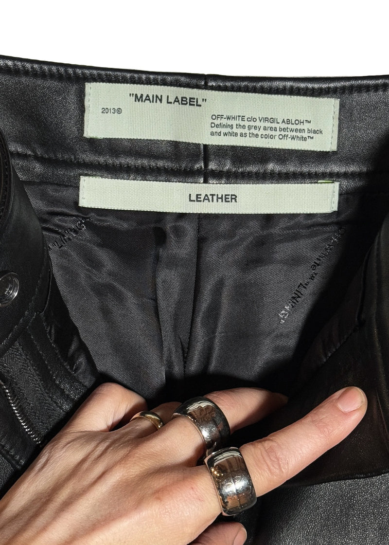 interior branding and composition labels of the Off-White Black Leather Tied-Ankle Pants