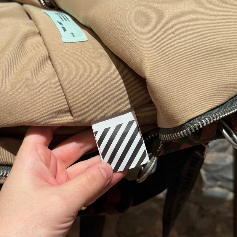 Brand detail of Off-white Green Camouflage Arrow Print Backpack