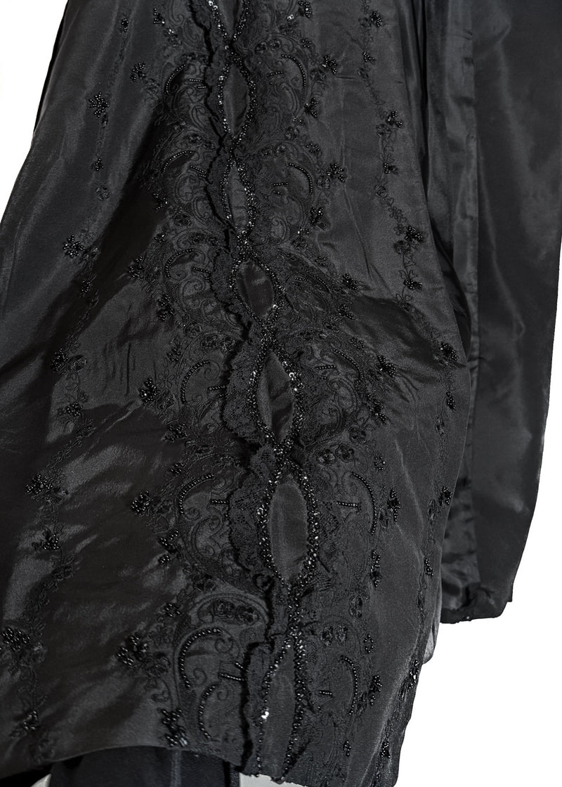 Close-up of intricate black lace and bead embroidery detailing of Prada 2016 Black Floral Embroidered Lace Silk Duster Coat