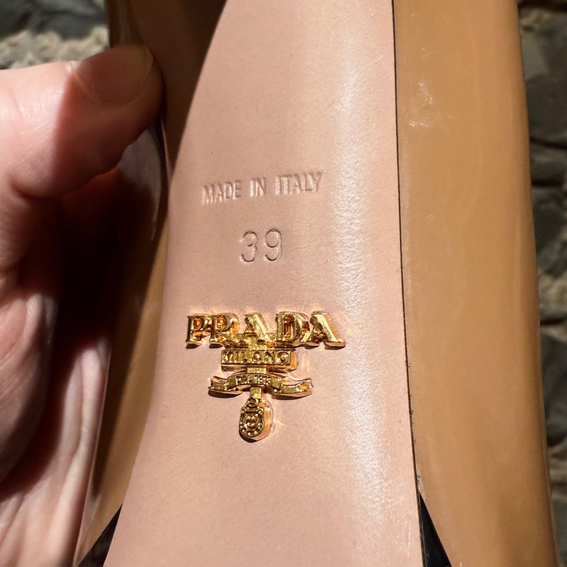 Origin and size stamps on an outsole of Prada Beige Black Patent Open Toe Pumps