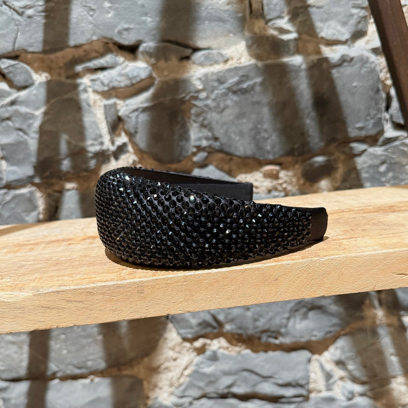 A side view of Prada Black Crystal Embellished Wide Headband