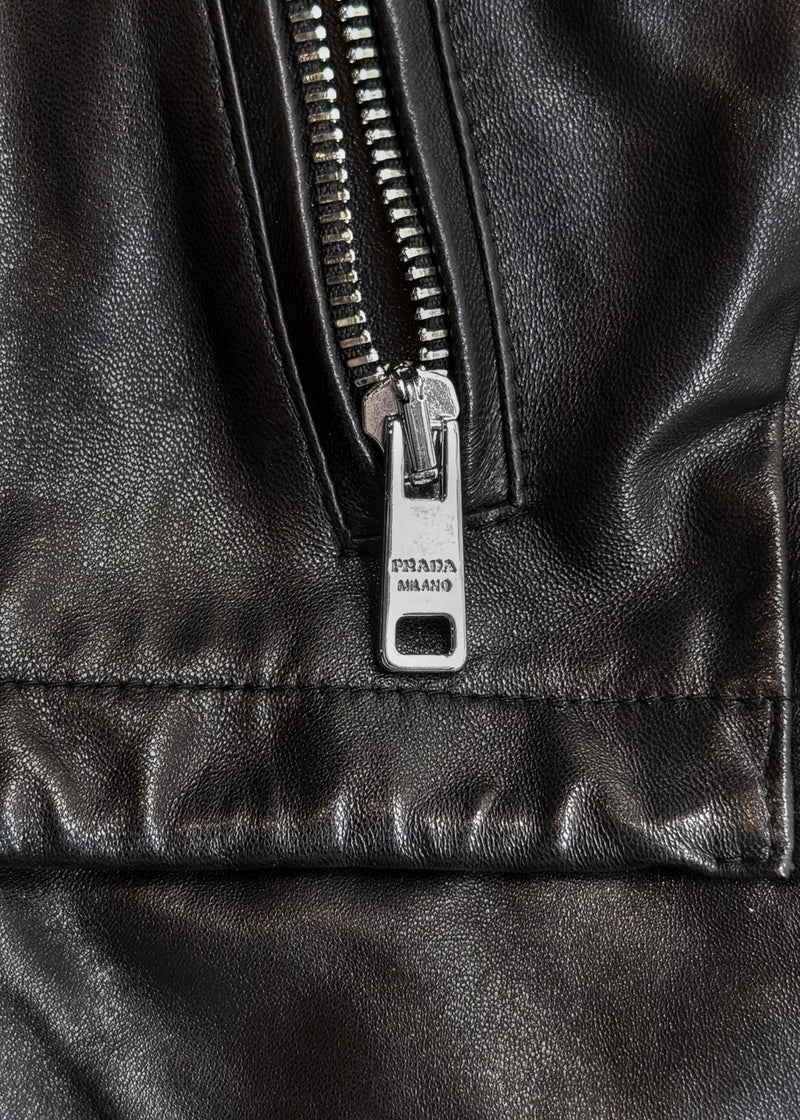 A branded zipper pull of Prada Black Leather Nylon Lined Crop Sleeves Trench Coat