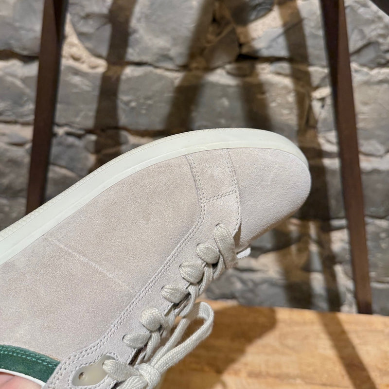 Prada Linea Rossa light grey suede low-top sneakers with green accents, showing details, wear, and branding.