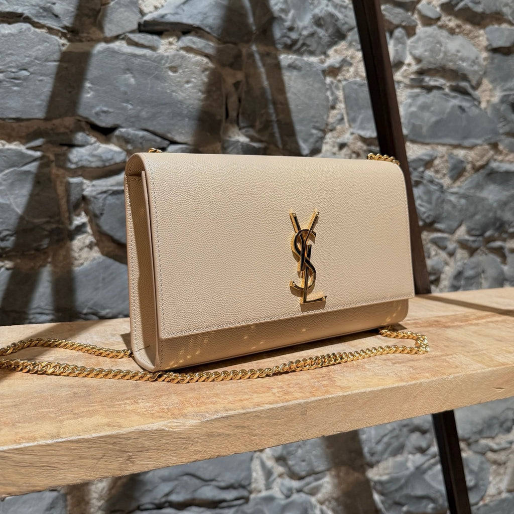 Side front view of Saint Laurent Beige Grain de Poudre Medium Kate Chain Bag