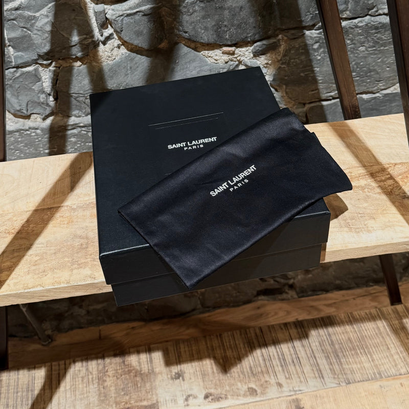 Packaging and dustbag of Saint Laurent Black Leather Wood Platform Candy Sandals