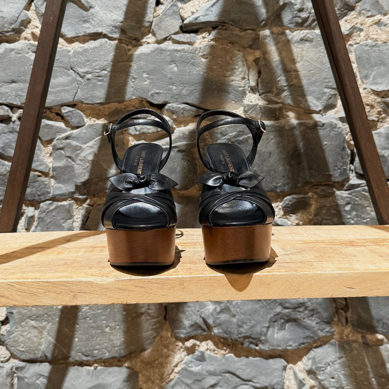 Front view of Saint Laurent Black Leather Wood Platform Candy Sandals