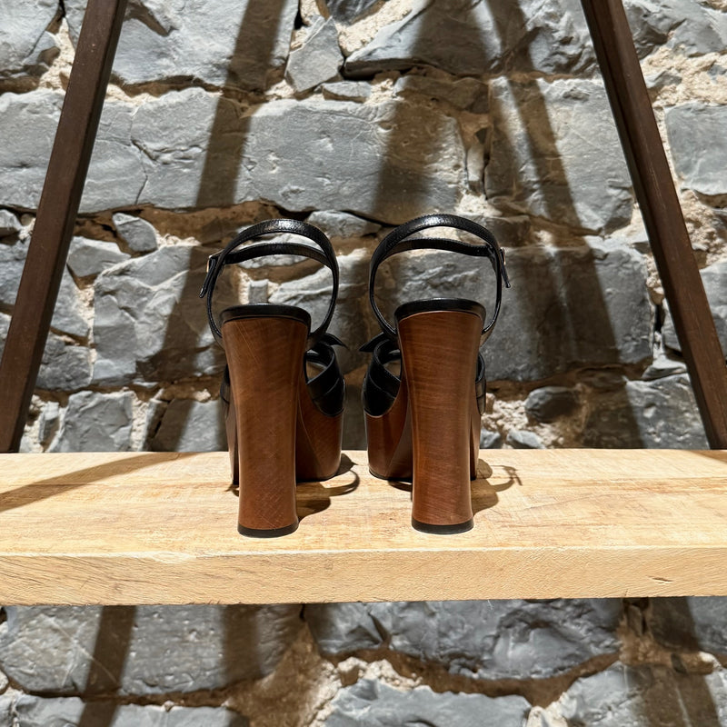 Back view of Saint Laurent Black Leather Wood Platform Candy Sandals