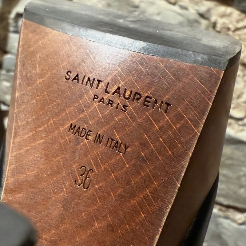 Brand, origin and size stamps of Saint Laurent Black Leather Wood Platform Candy Sandals