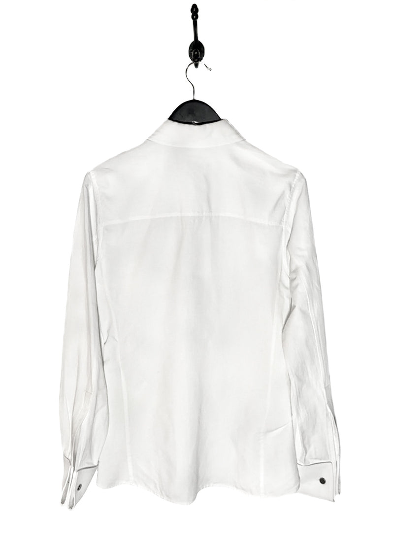 Saint Laurent YSL Logo White Linen Blend Buttoned Shirt. A white button-up shirt featuring a pointed collar, tonal embroidered YSL logo on the chest pocket, and engraved buttoned cuffs. Made in Italy, crafted from a linen-cotton blend, with a clean and lightweight silhouette.