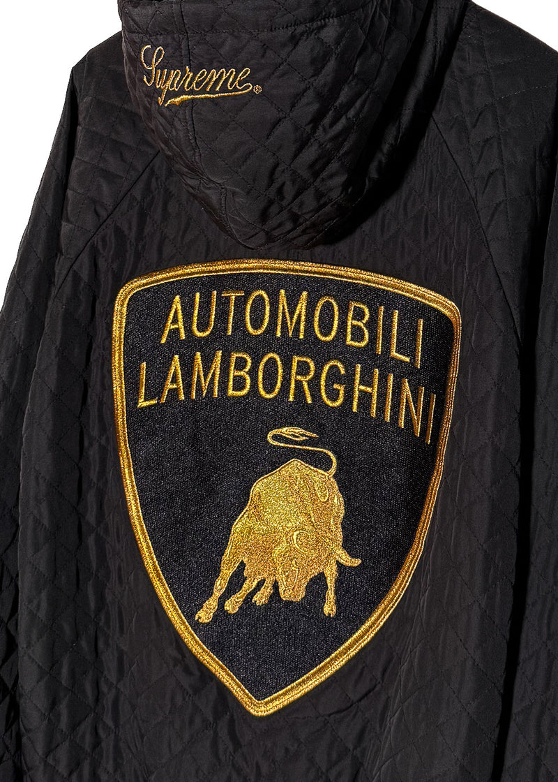 Patch close up on the back of Supreme Automobili Lamborghini Black Quilted Hooded Jacket