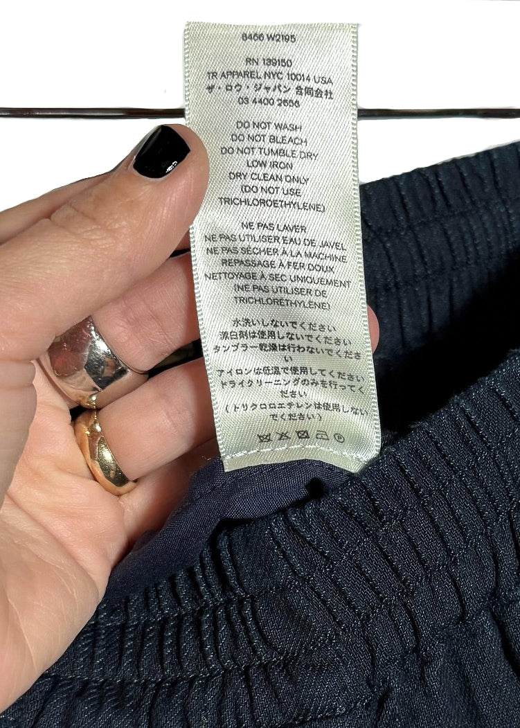 Care label of The Row Dark Navy Blue Elastic Waist Jogger Jeans