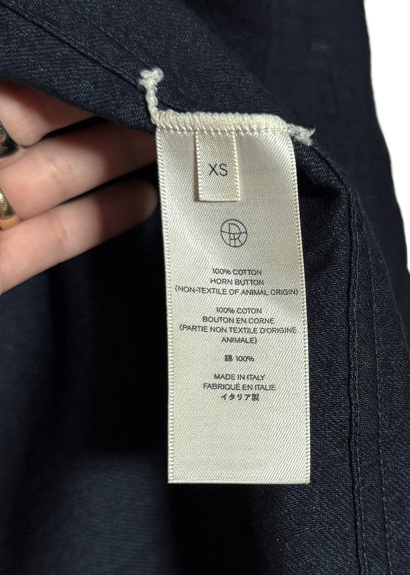 Size and material labels of The Row Navy Blue Oversized Cotton Beckman Chore Jacket