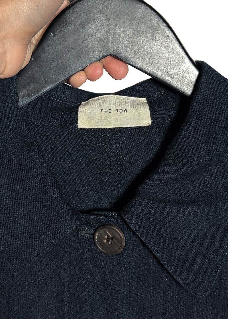 Pointed collar and brand label of The Row Navy Blue Oversized Cotton Beckman Chore Jacket