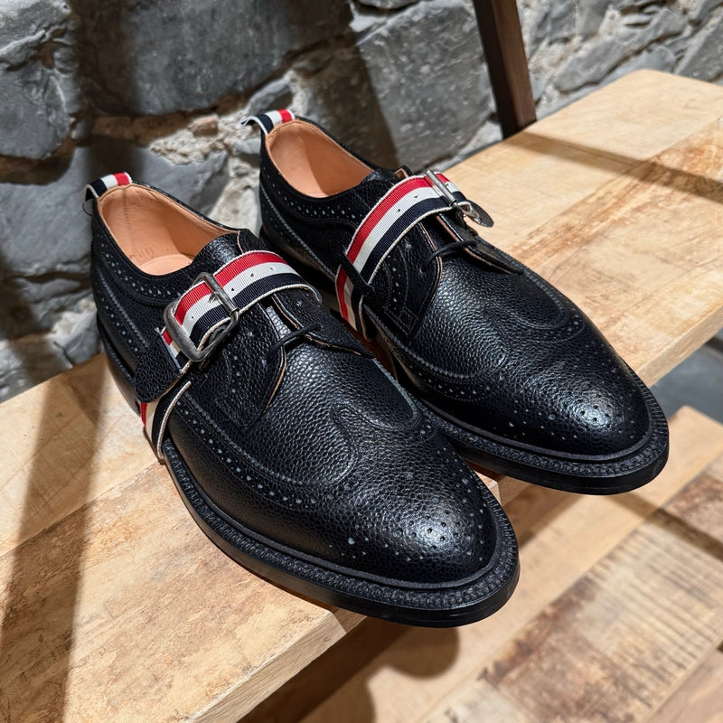 Tow box of Thom Browne Black Pebbled Grosgrain Tricolour Strap Long Wingtip Shoes