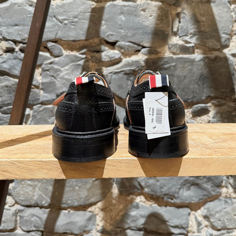 Back view and tags of Thom Browne Black Pebbled Grosgrain Tricolour Strap Long Wingtip Shoes