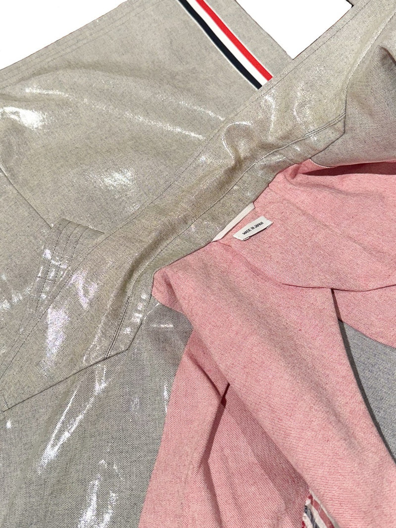 Close-up on Thom Browne Coated Cotton Coat