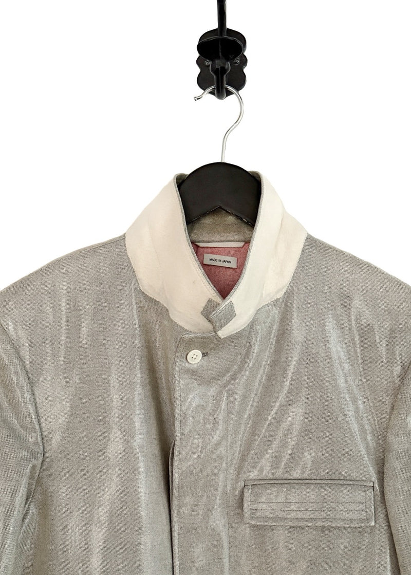 Collar area of Thom Browne Coated Cotton Coat