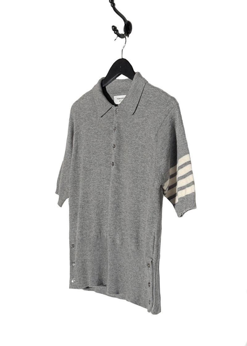 Side front view of Thom Browne Grey Cashmere 4-Bar Short Sleeve Knit Polo Shirt