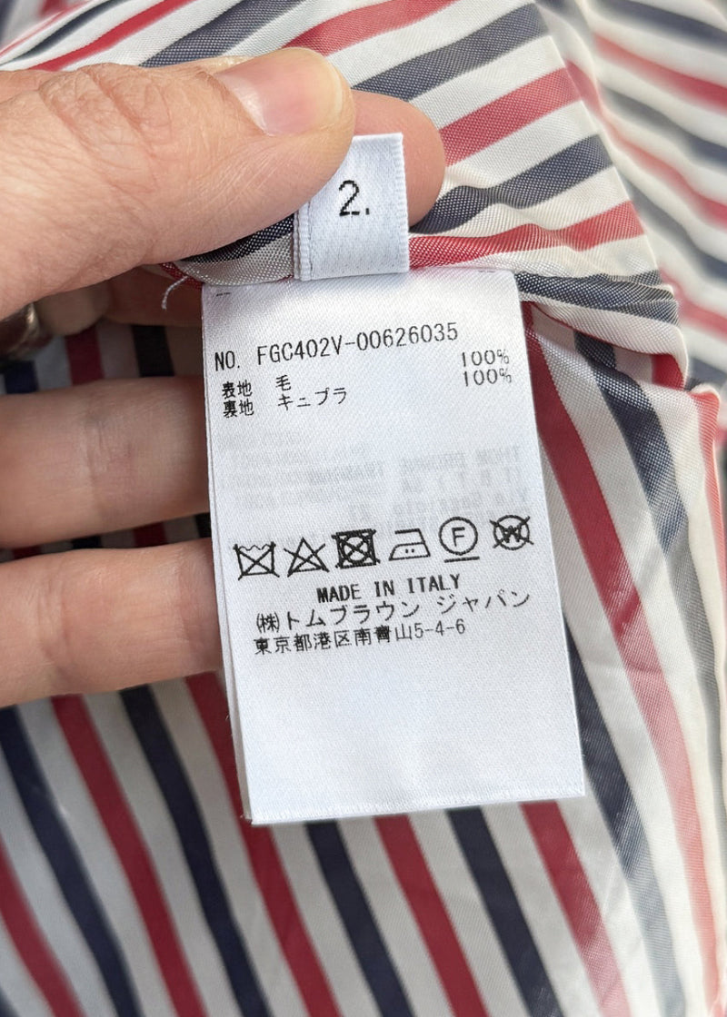 Care label of Thom Browne Grey Wool Pleated Skirt