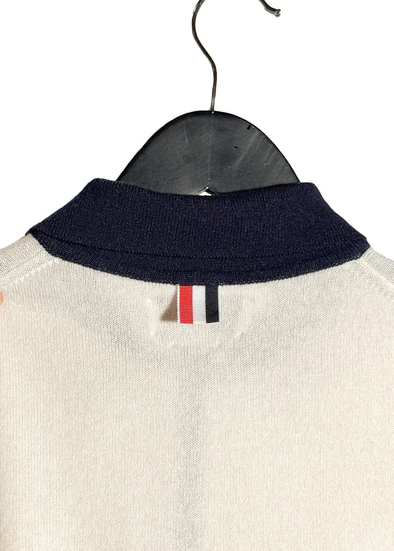 Brand detail on Thom Browne Ivory Colourblock Red Navy Cashmere Polo Shirt