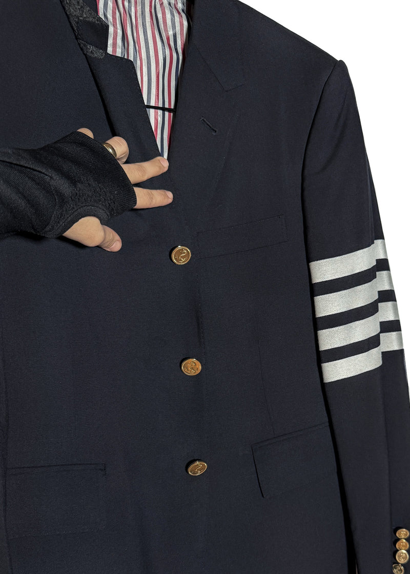 Front buttoned closure of Thom Browne Navy Blue 4 Bands Wool Suit