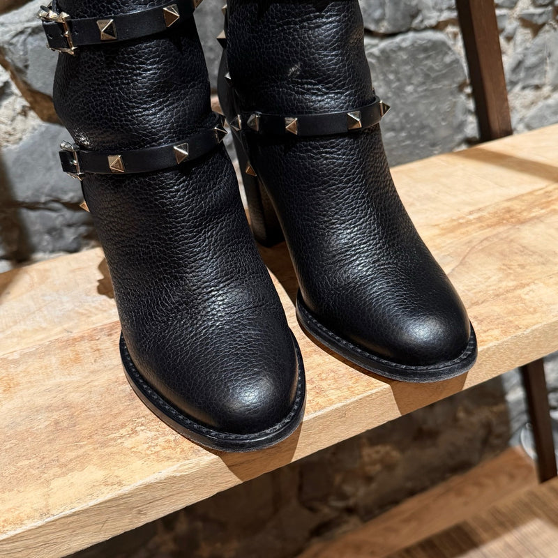 Tow box of Valentino Black Grained  Leather Rockstud Heeled Ankle Boots