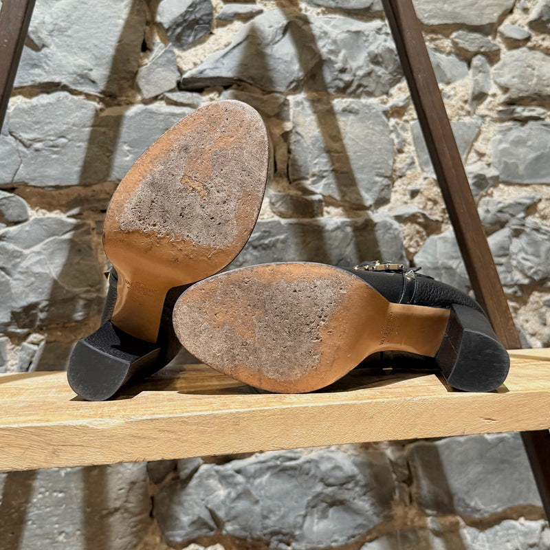 Branded outsole of Valentino Black Grained  Leather Rockstud Heeled Ankle Boots