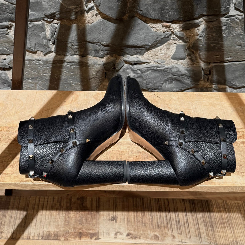 Side-by-side view of Valentino Black Grained  Leather Rockstud Heeled Ankle Boots