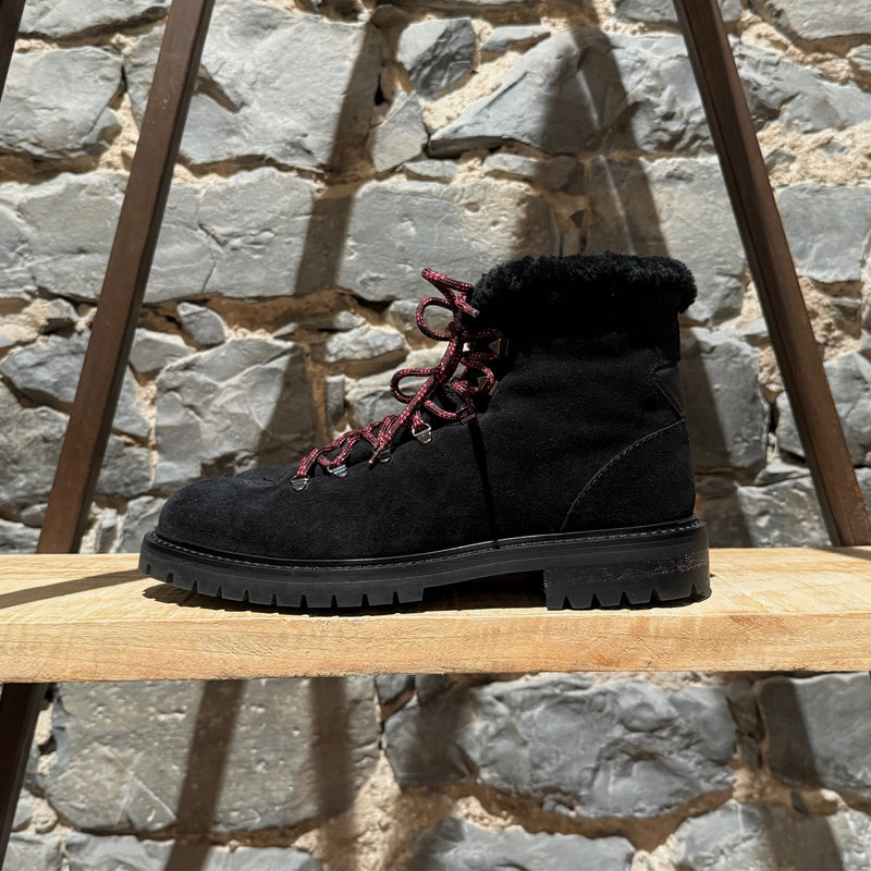 A side view of Valentino Black Suede Shearling Lined Winter Hiking Boots
