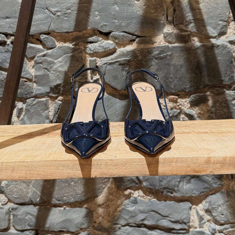 Front of Valentino Navy Blue Patent Vlogo Slingback Pumps