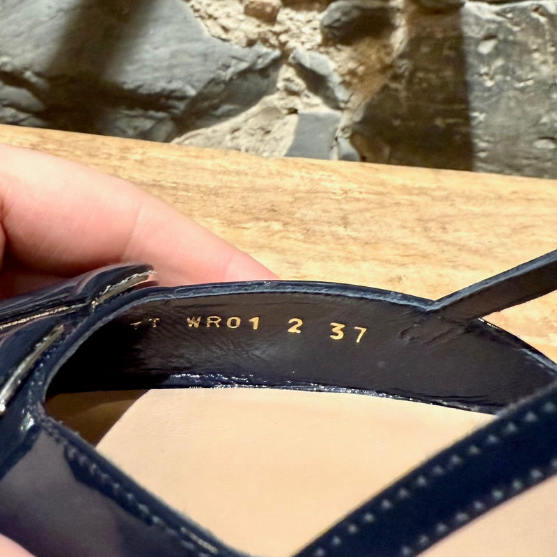 Serial number and size stamps on Valentino Navy Blue Patent Vlogo Slingback Pumps