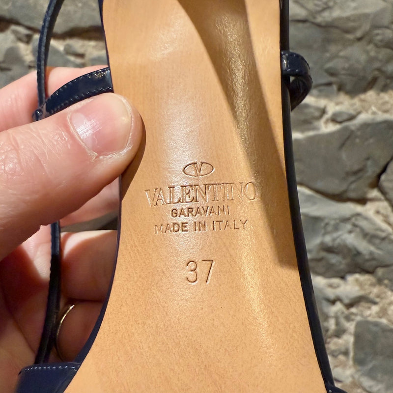 Brand, origin and size stamps on outsole of Valentino Navy Blue Patent Vlogo Slingback Pumps