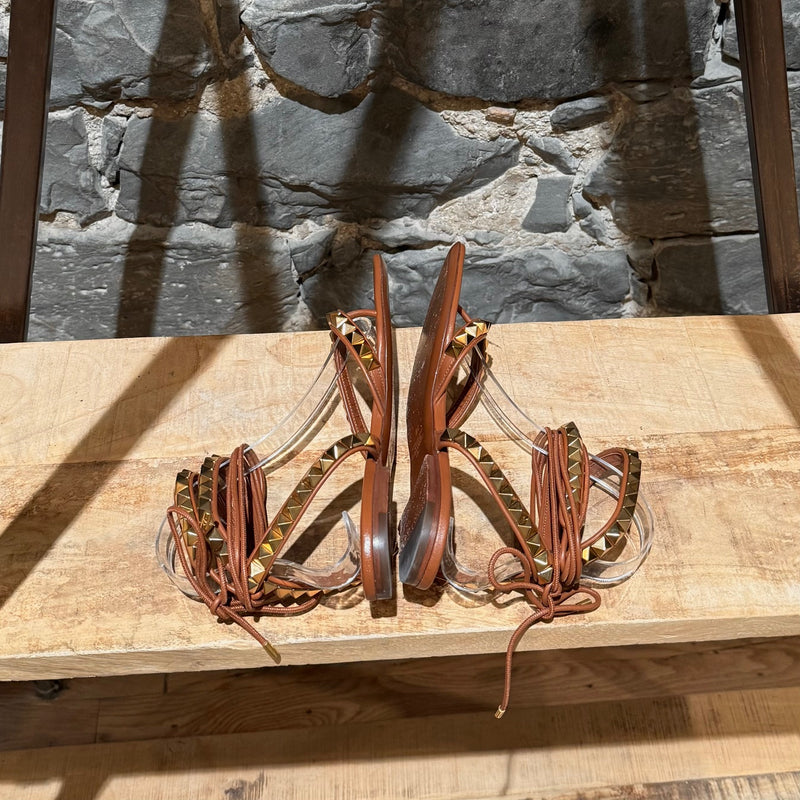 Side-by-side view of Valentino Brown Leather Gold Studded No Limit Gladiator Flat Sandals