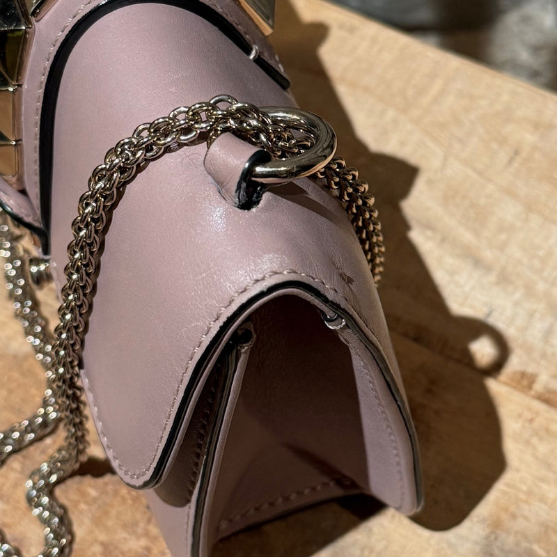 Top corner of Valentino Poudre Pink Leather Small Glam Lock Chain Bag