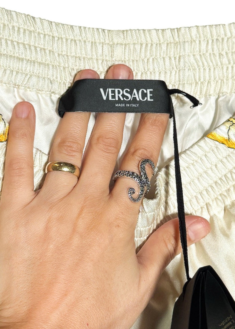 Waistband area of Versace Coral Theatre Print White Gold Silk Jogger Shorts