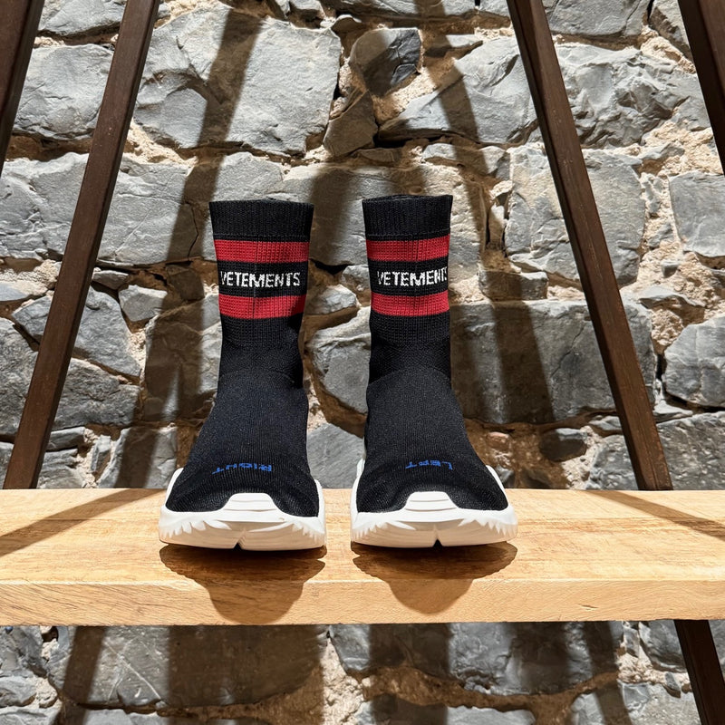 Front view of Vetements x Reebok Black Sock Pump Logo High-top Sneakers